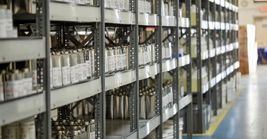 Specialty chemicals distributor warehouse, showcasing stocked chemicals