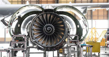 Aircraft engine on a production floor in an aerospace manufacturing facility