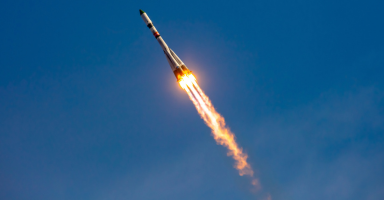 Commercial rocket launching into the sky